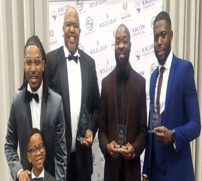 EX-CRICKETER ROLLINS RECEIVES AWARD