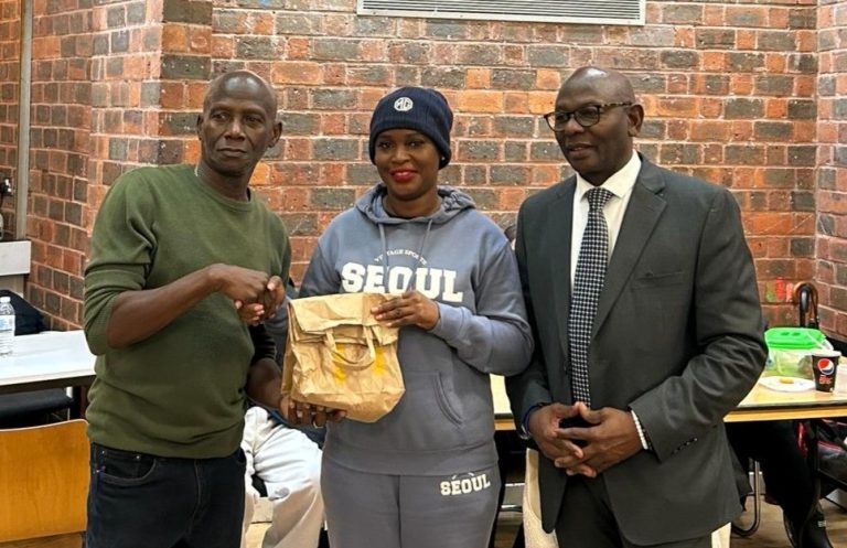 Yvonne Johnson presented with monies from collection